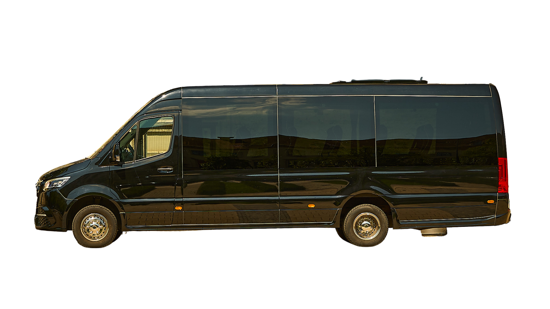 Side view of a black, extended passenger van on a white background.