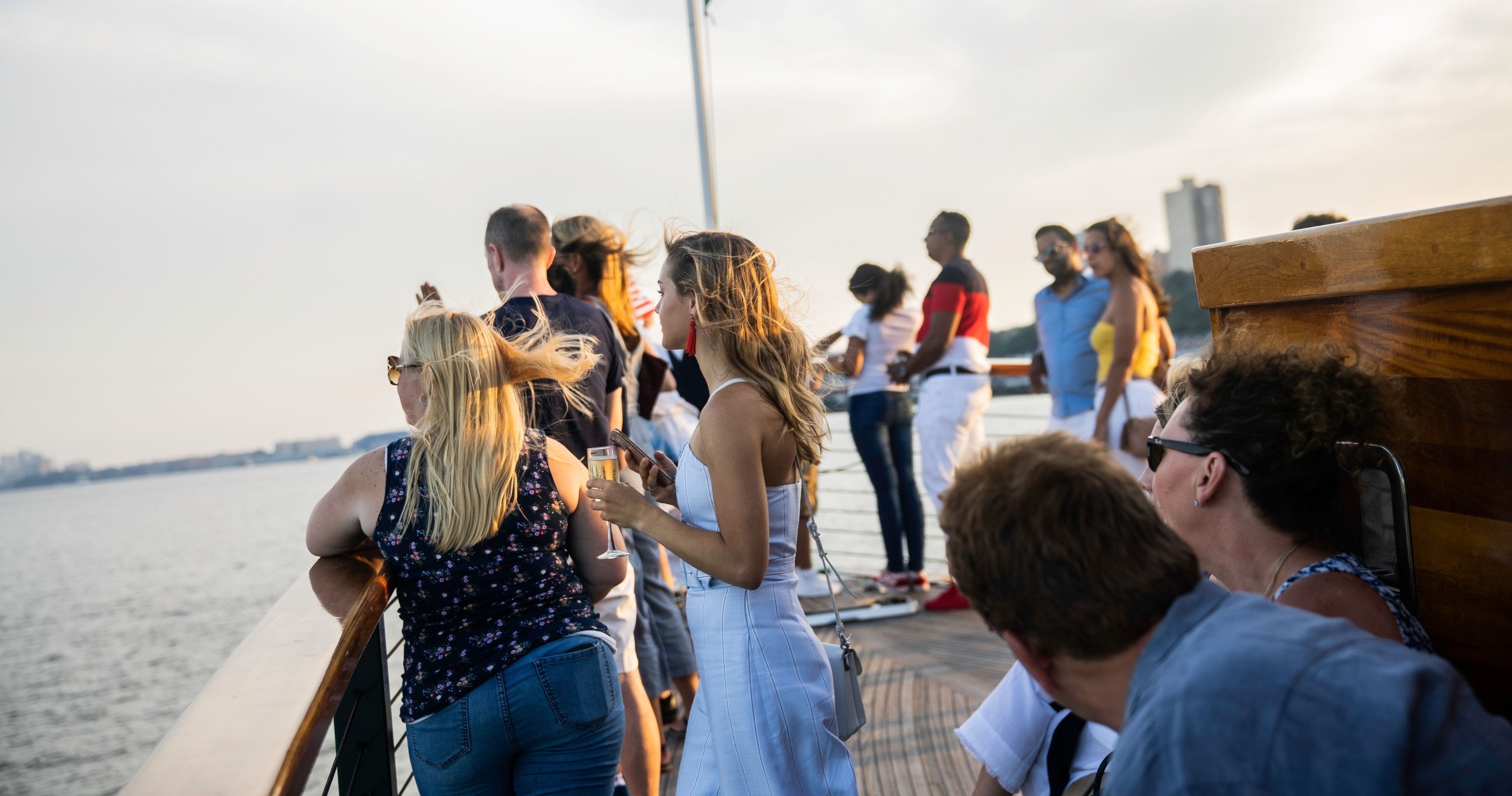 People on a boat enjoying a scenic water view.