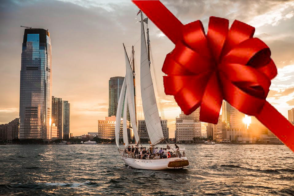Sailboat in city harbor at sunset with a red bow overlay.