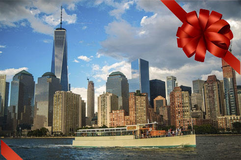 Boat on river with city skyline and red ribbon decoration.