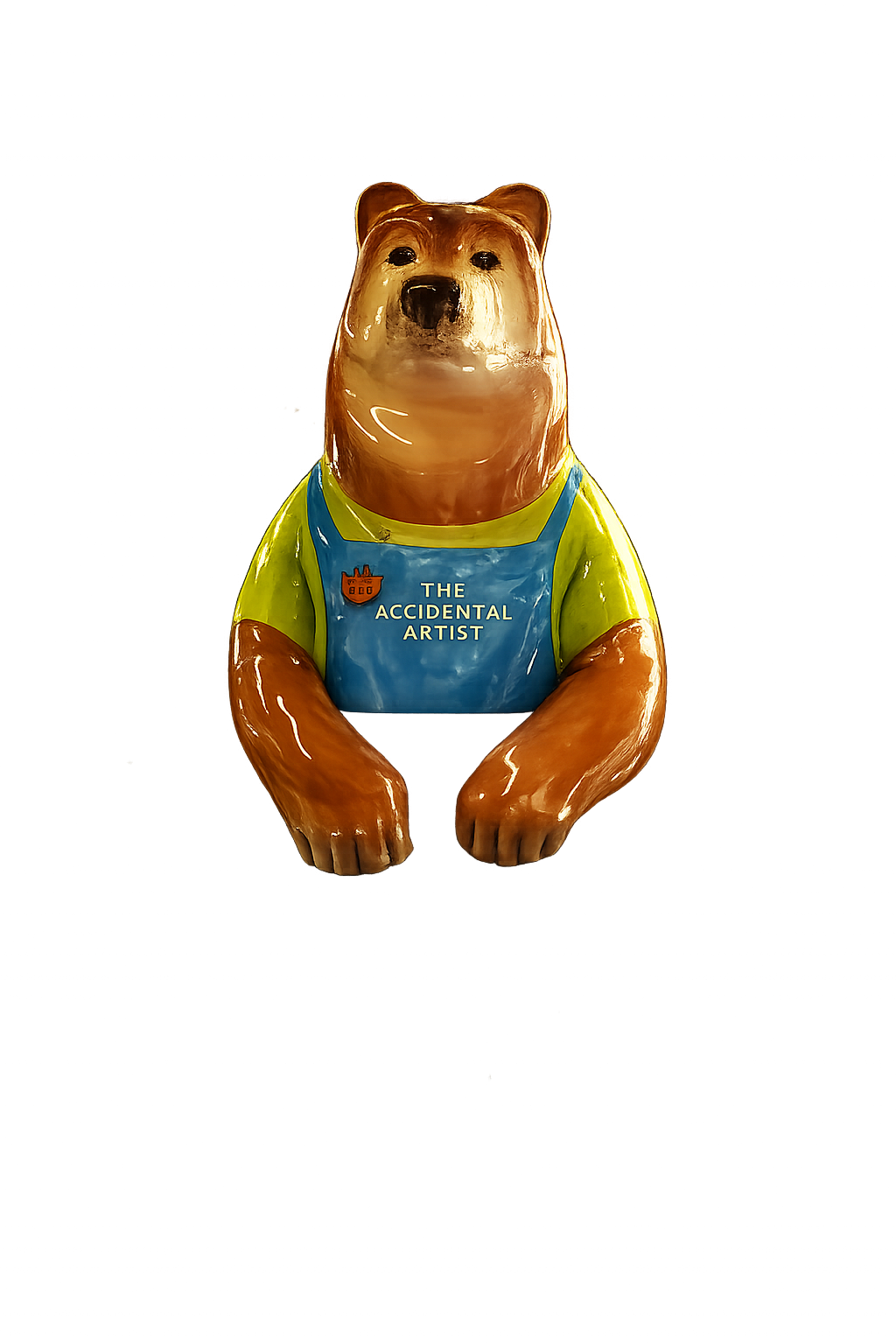 Bear statue wearing a colorful shirt with text 'The Accidental Artist'.